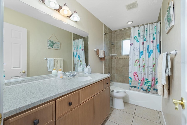 full bathroom with tile patterned flooring, vanity, shower / bath combination with curtain, and toilet