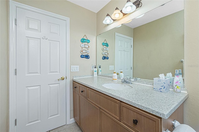 bathroom featuring vanity and tile patterned floors