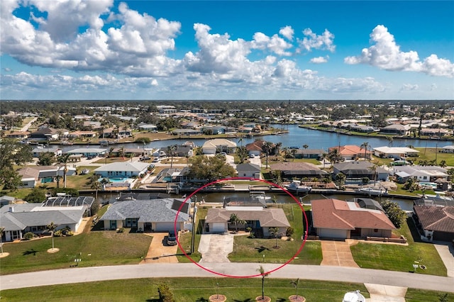 bird's eye view with a water view