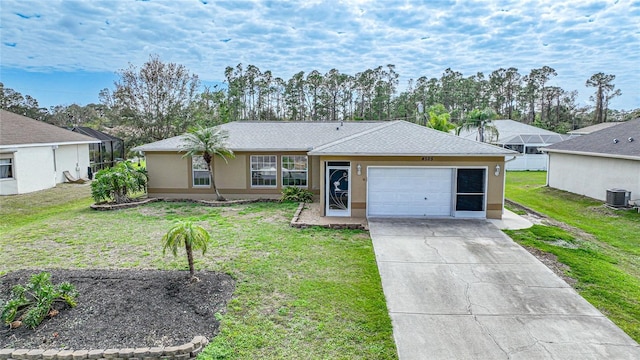 ranch-style home with central AC unit, a garage, and a front lawn