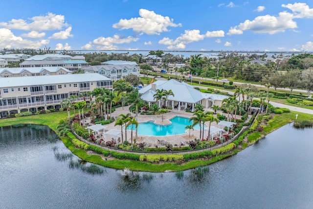 birds eye view of property featuring a water view