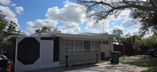 view of home's exterior with a patio area