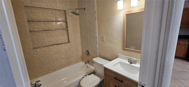 full bathroom with tiled shower / bath combo, vanity, tile patterned flooring, and toilet