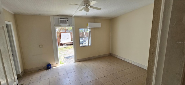 tiled empty room with an AC wall unit and ceiling fan