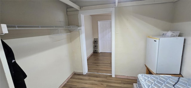 laundry room featuring hardwood / wood-style floors