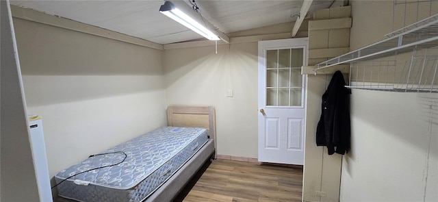 bedroom featuring hardwood / wood-style flooring