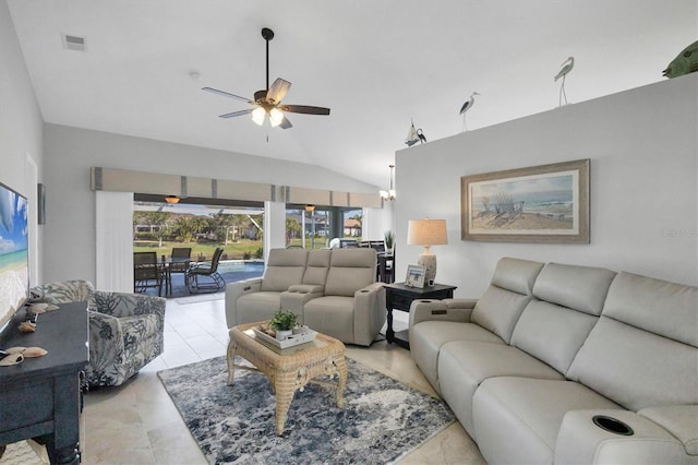 living area with light tile patterned floors, visible vents, vaulted ceiling, and ceiling fan with notable chandelier