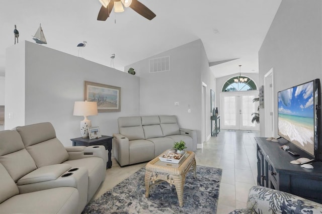 living room with light tile patterned floors, high vaulted ceiling, ceiling fan with notable chandelier, visible vents, and french doors