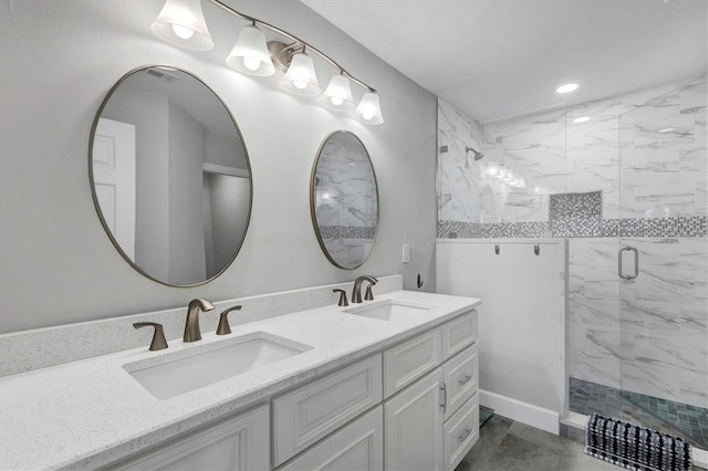 full bathroom featuring a stall shower, visible vents, a sink, and double vanity