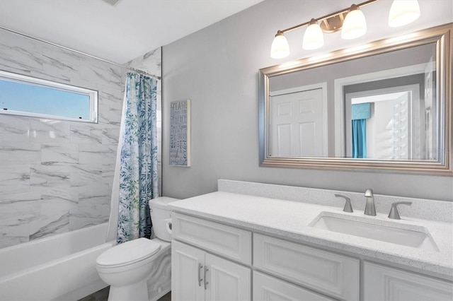 bathroom featuring toilet, vanity, and shower / bathtub combination with curtain