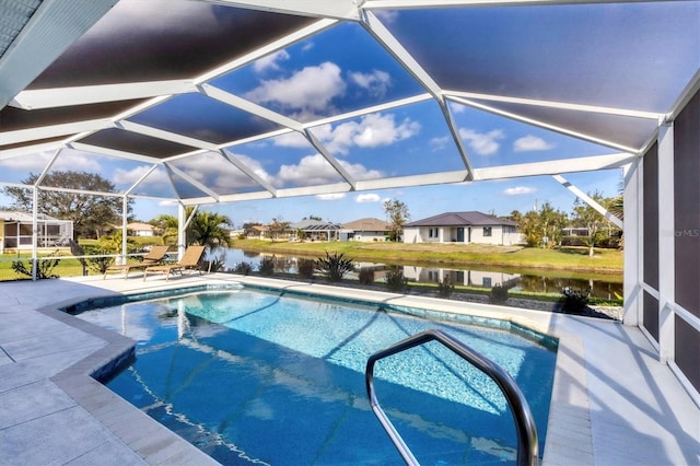 pool featuring a lanai, a water view, and a patio