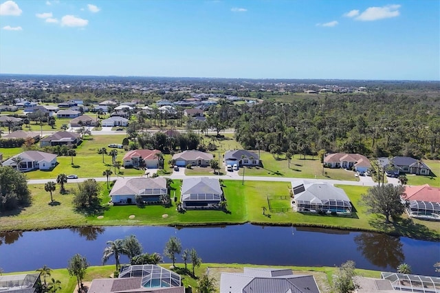 bird's eye view with a water view and a residential view