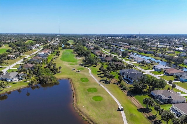 aerial view featuring a residential view, a water view, and golf course view