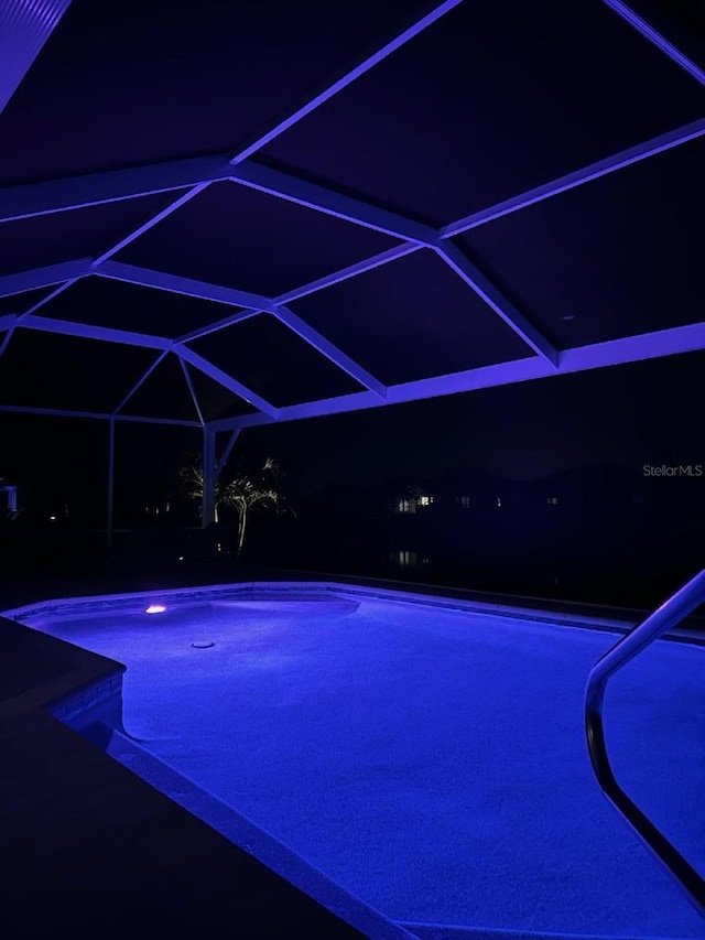 outdoor pool featuring a lanai