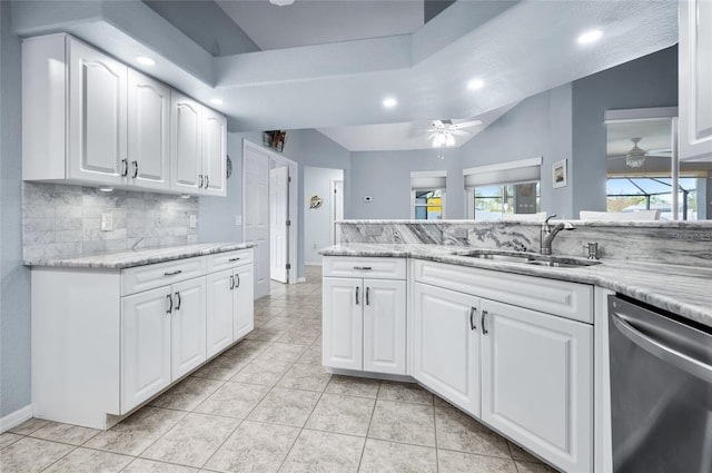 kitchen featuring dishwasher, white cabinetry, sink, and ceiling fan