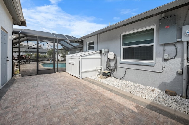 view of patio / terrace with glass enclosure