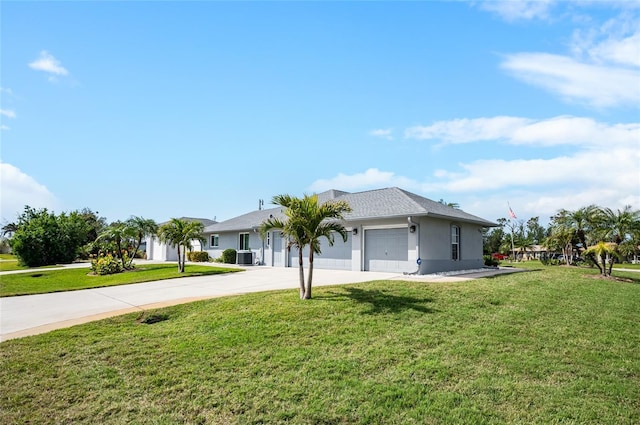 single story home featuring a garage, central AC unit, and a front lawn