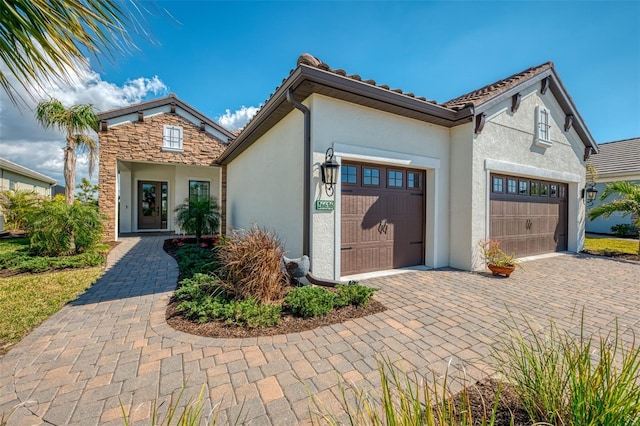 view of front of property featuring a garage