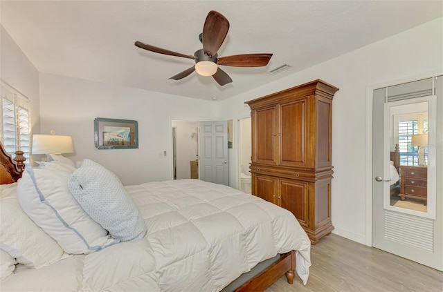 bedroom featuring ceiling fan and light hardwood / wood-style floors