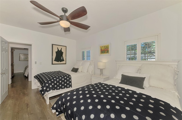 bedroom featuring hardwood / wood-style floors and ceiling fan