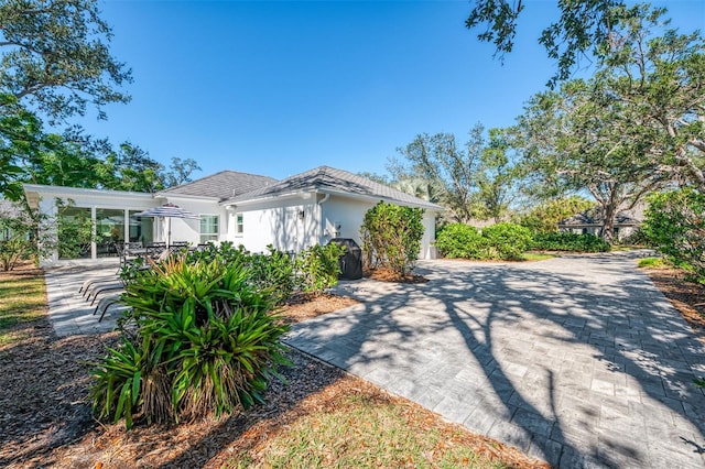 view of front of property featuring a patio