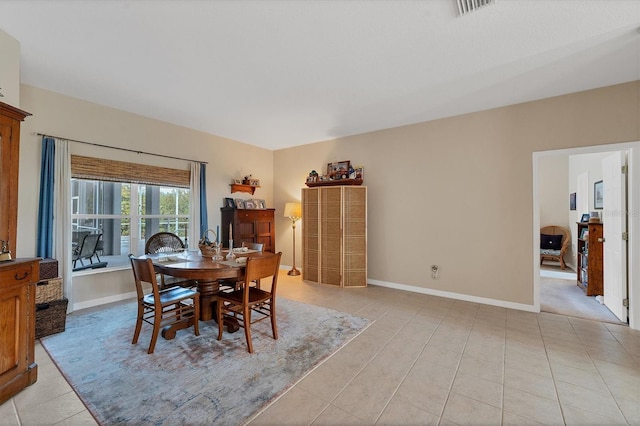 view of tiled dining space