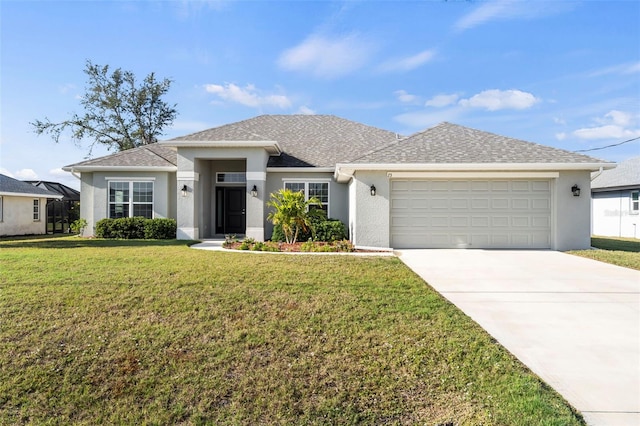 view of front of home featuring a garage and a front lawn