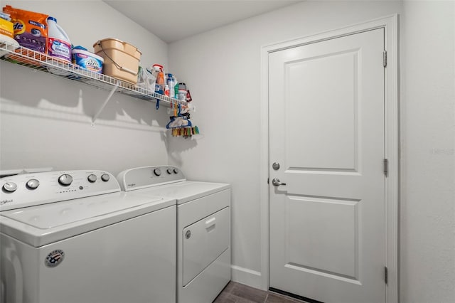 clothes washing area featuring washing machine and dryer