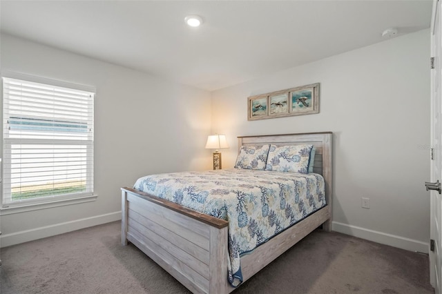 bedroom featuring carpet