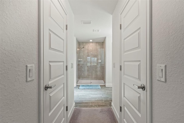 hall featuring wood-type flooring