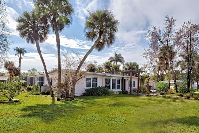 view of front of home with a front yard