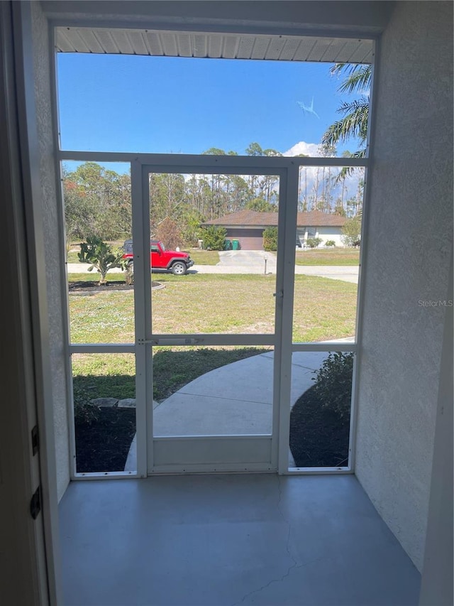 entryway featuring concrete flooring