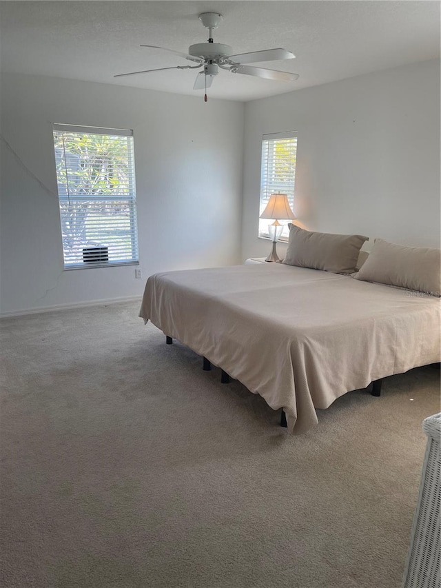 bedroom with carpet floors and ceiling fan