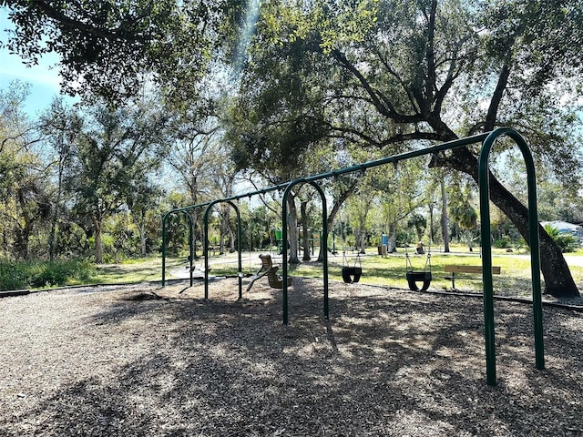 surrounding community featuring a playground