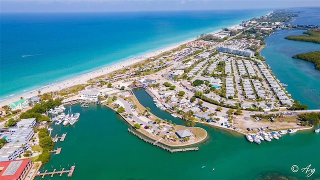 aerial view featuring a view of the beach and a water view