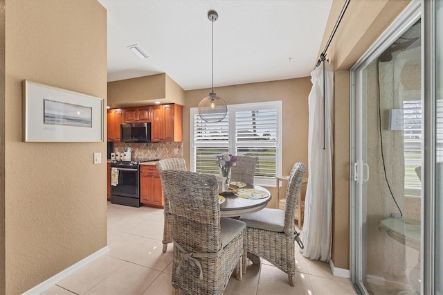 view of tiled dining space