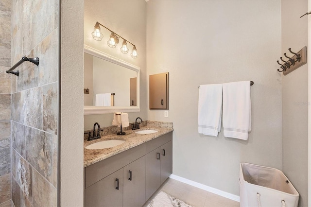 bathroom with vanity and tile patterned floors