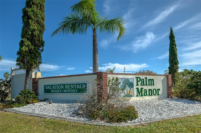 view of community sign