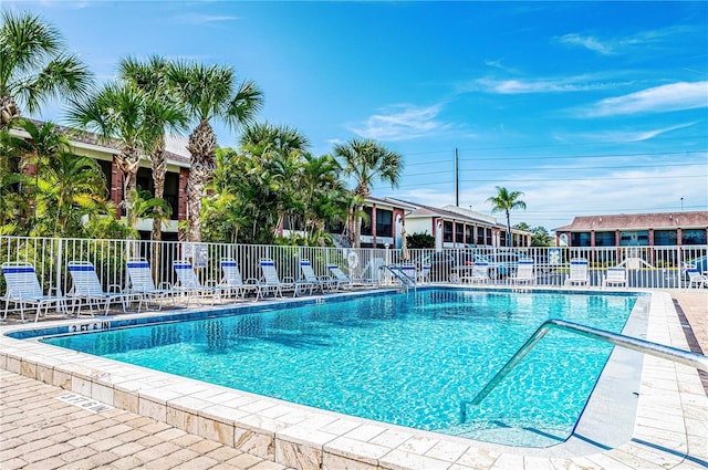 view of swimming pool featuring a patio