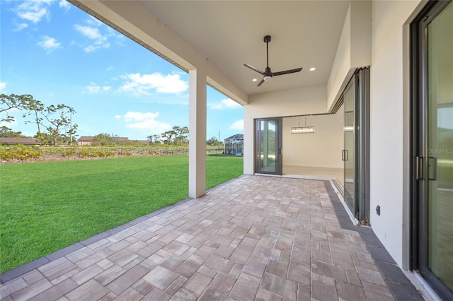 view of patio with ceiling fan