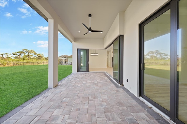 view of patio with ceiling fan