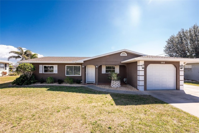 ranch-style house featuring a garage and a front yard