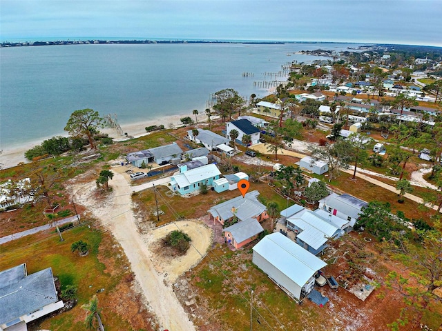 aerial view with a water view and a residential view