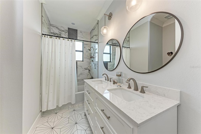 bathroom with vanity and shower / bath combo