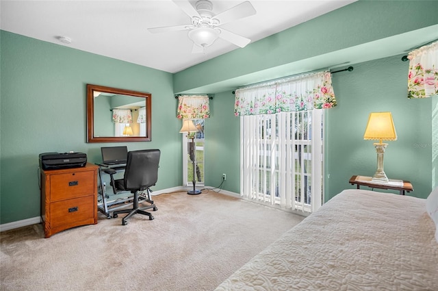 bedroom with light colored carpet, access to exterior, and ceiling fan