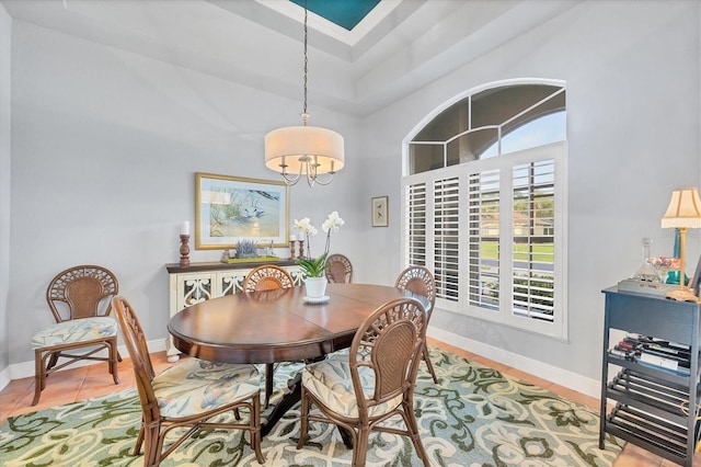 dining space with a high ceiling