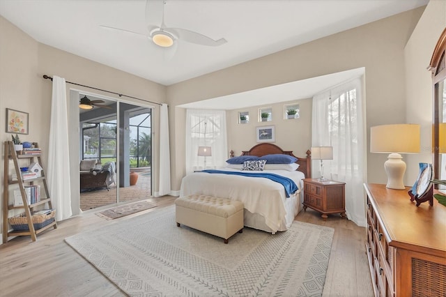 bedroom with ceiling fan, access to exterior, and light hardwood / wood-style floors