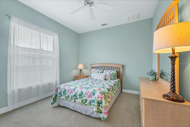 bedroom with light colored carpet and ceiling fan