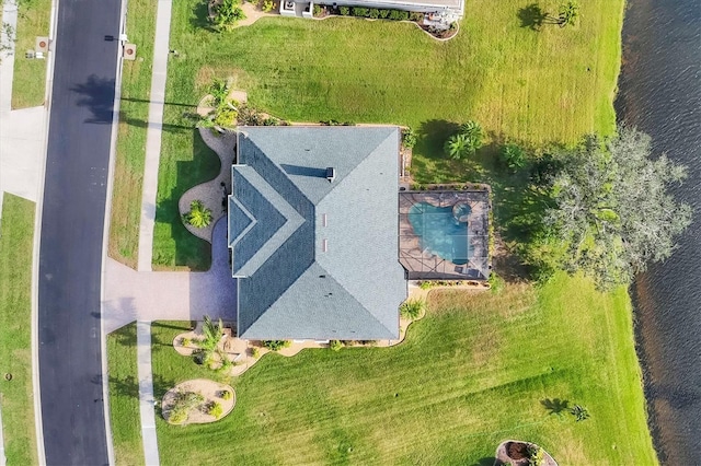 bird's eye view with a water view