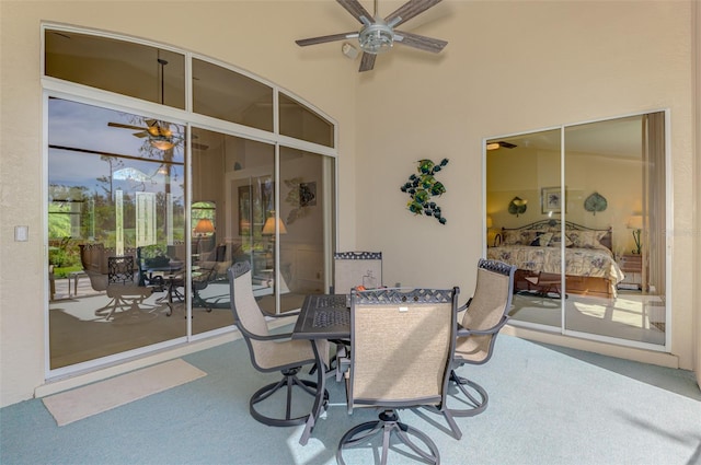 view of patio / terrace featuring ceiling fan and outdoor dining area